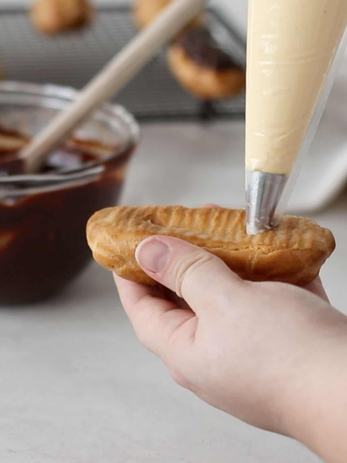 How do you fill Eclairs without cutting them?