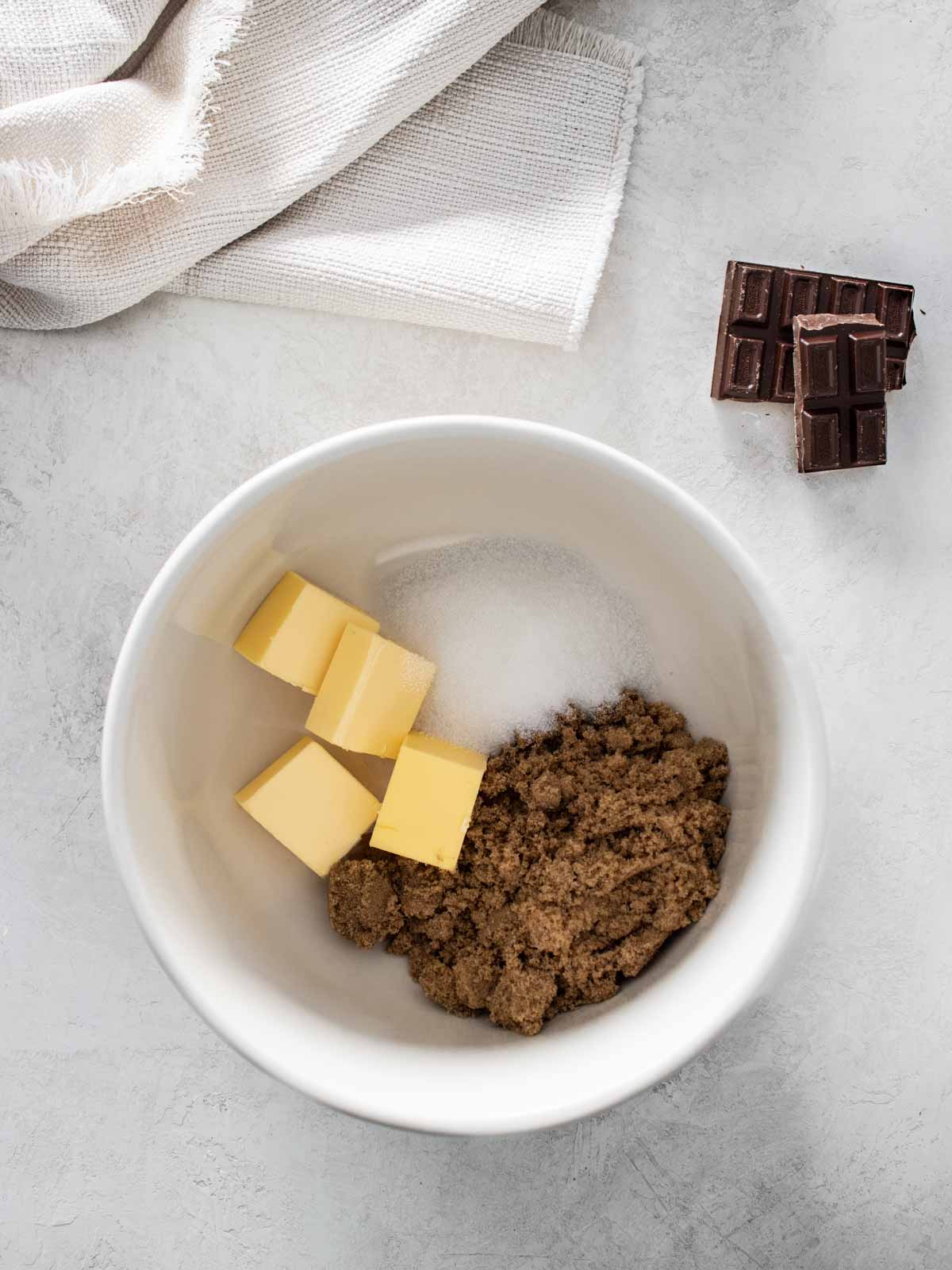 butter, brown sugar and white sugar in a bowl