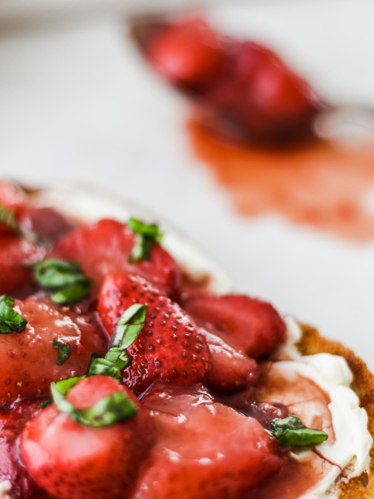 Balsamic Strawberries on toast with basil