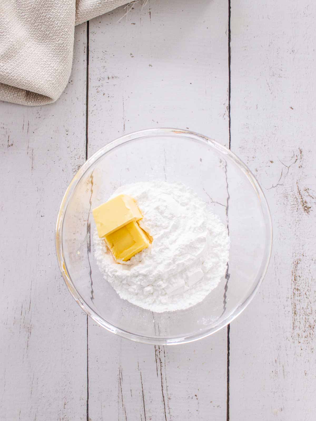 Icing sugar and butter in a bowl